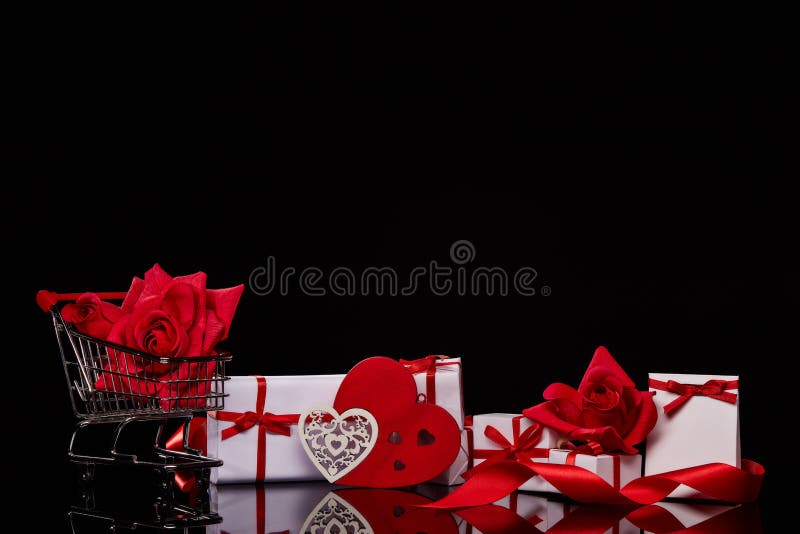 Shopping trolley with gifts. Valentine`s day