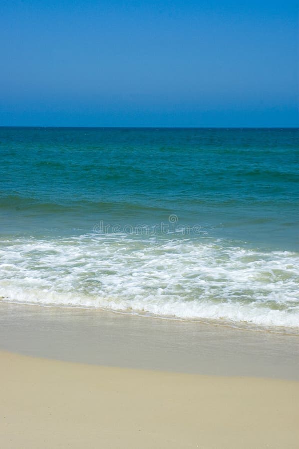 Shoreline and blue sky