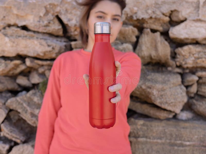 https://thumbs.dreamstime.com/b/short-haired-teenage-girl-pink-hoodie-staying-near-stone-wall-red-water-bottle-serious-teenager-pink-hoodie-red-253411705.jpg