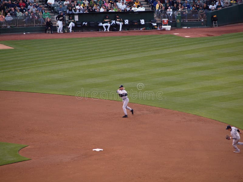 Yankees 6 vs A's 2: Yankees shortstop Derek Jeter readies to throw to 1st. Taken July 7 2010 at the Coliseum in Oakland California