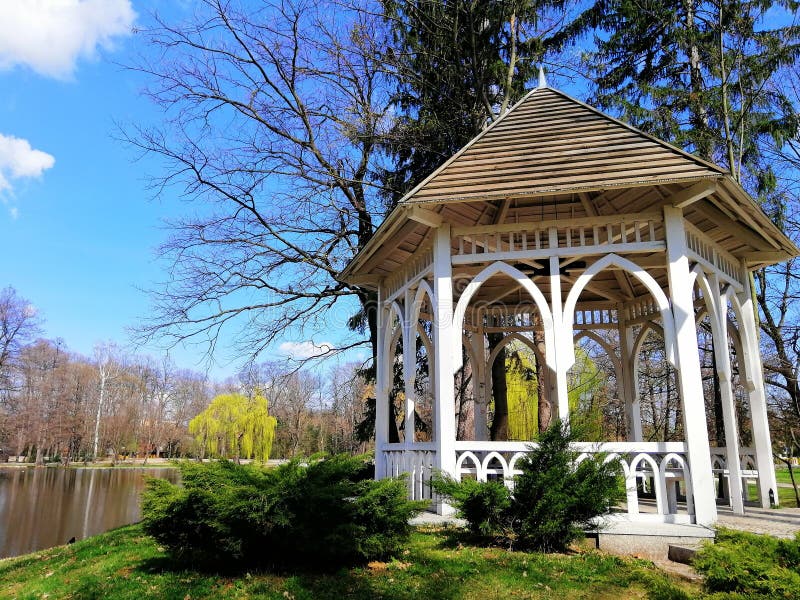 Shot of an arbor next to a pond in Park Norweski in Jelenia GÃ³ra, Poland