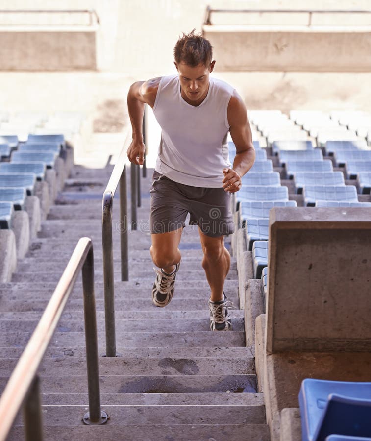 Youve Got To Push Hard To Win Shot Of An Athlete Running Up A Flight Of Stairs As Part Of His
