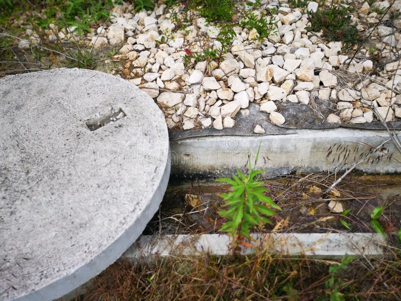 Shot of the Concrete Cover with Limestone and Canal in the Side Stock