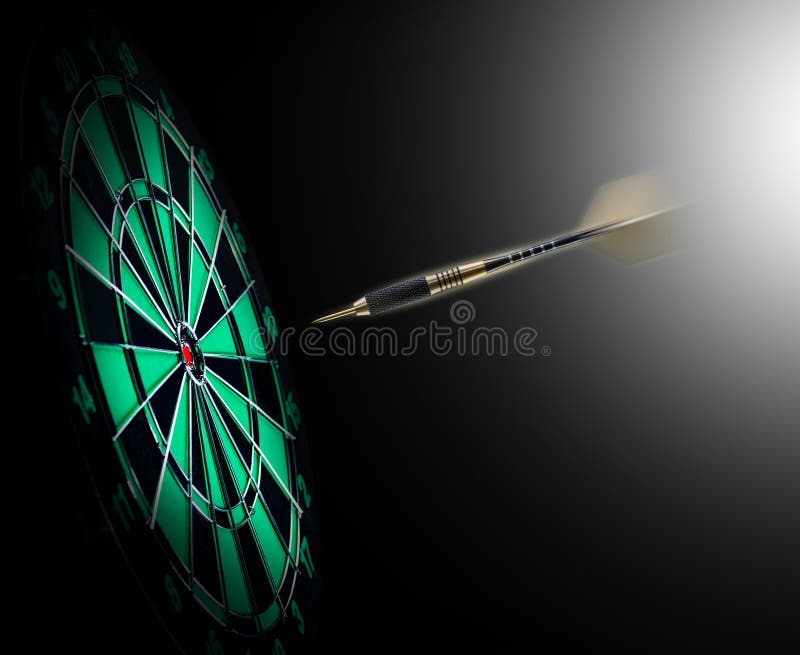 Shot of darts in bullseye royalty free stock image