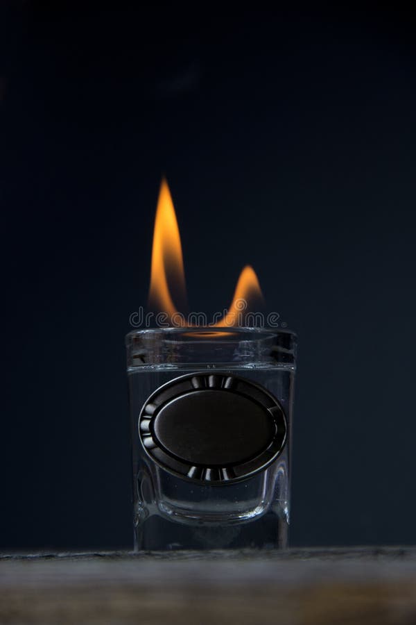 Shot glass on fire stock photo. Image of flaming, fire 84361802