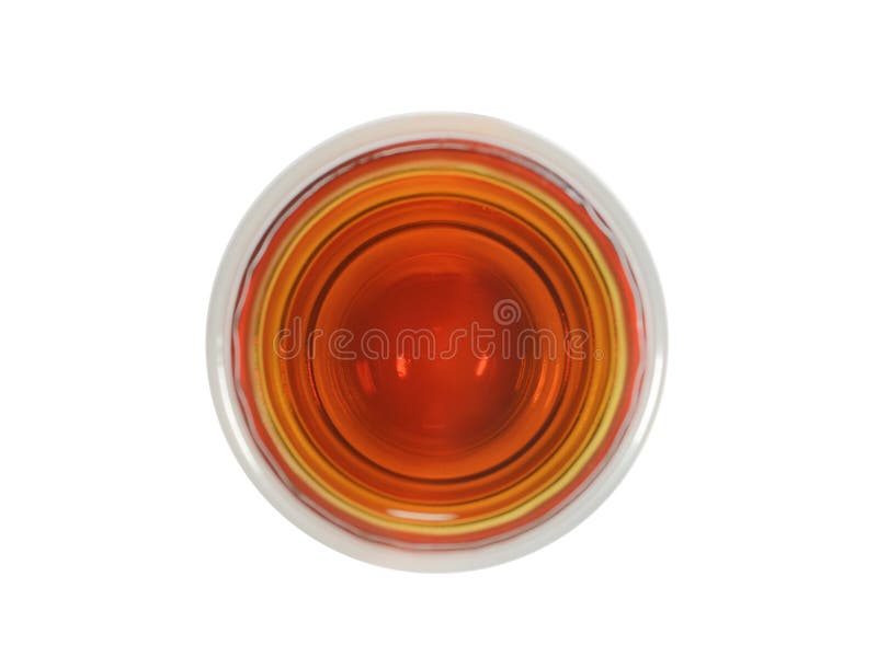 Glass of Whisky with Ice Pieces, the Top View on a White Background