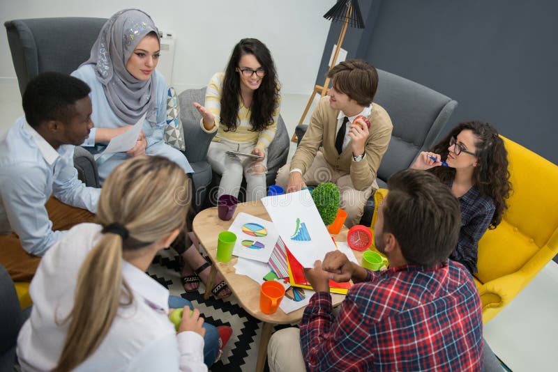 Shot of a group of young business professionals having a meeting. royalty free stock photography