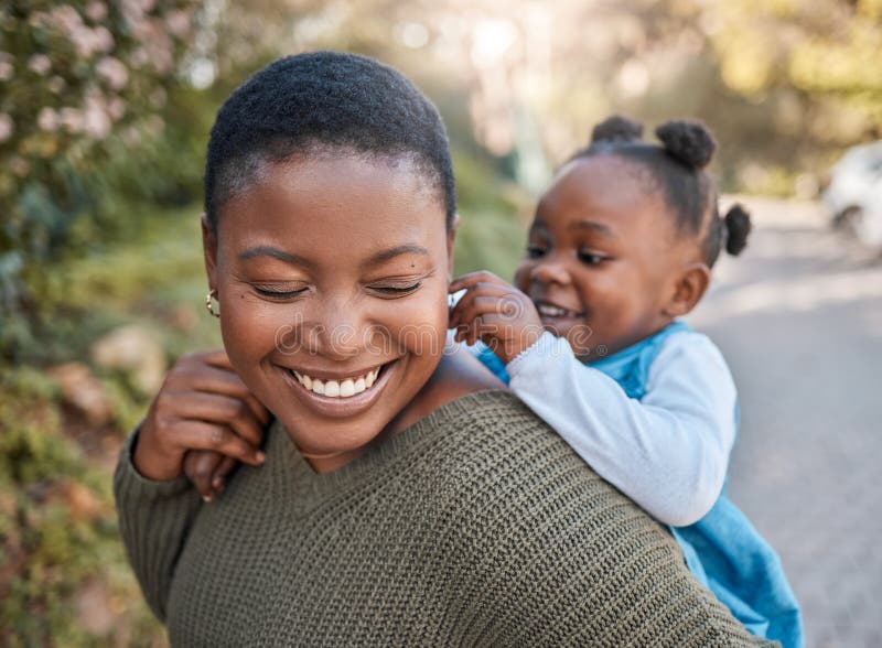 Are You Ready To Go Play Shot Of A Mother Giving Her Daughter A