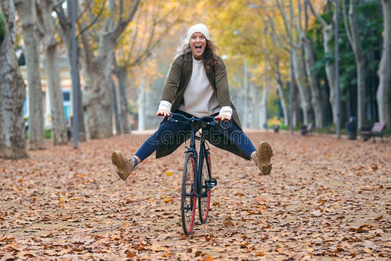 Pretty Funny Woman with a Vintage Bike Enjoying Time while Cycling through  the Park in Autumn Stock Image - Image of fashion, cold: 204939233
