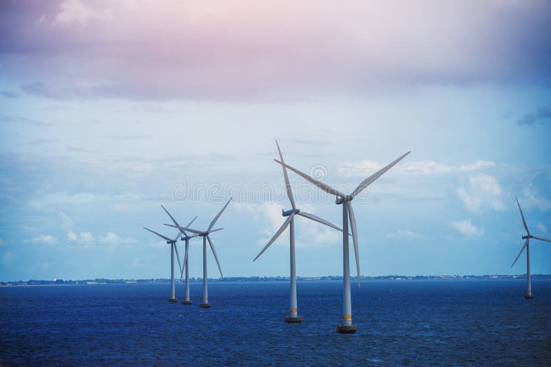 Alternative energy - shot of row of floating wind turbines