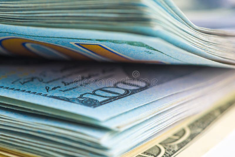 Shot of 100 US dollar bills, in the frame the dignity royalty free stock photos