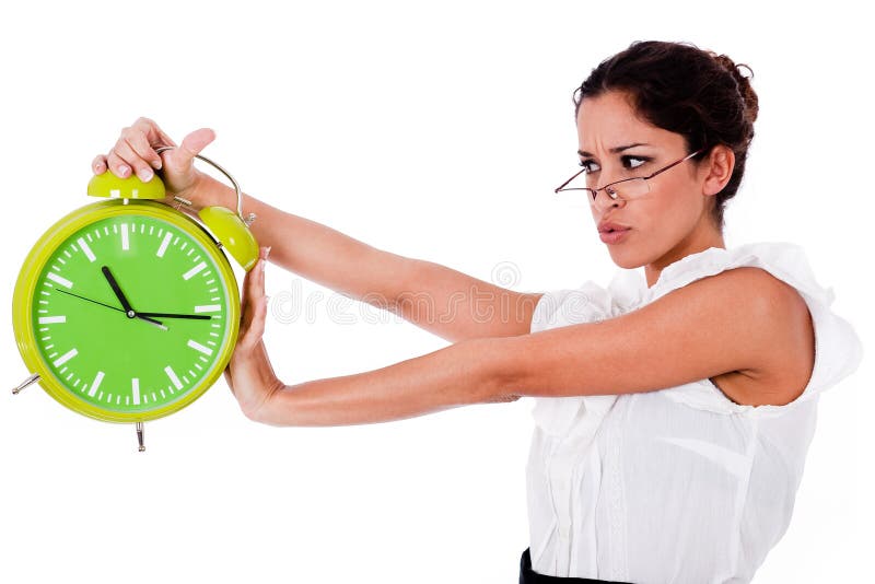 Shot of a Young business woman holding clock