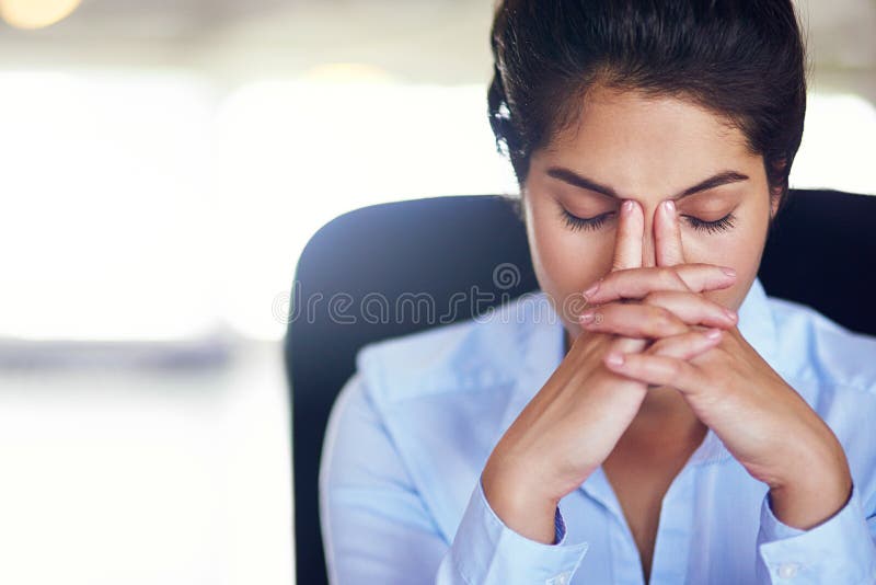 Her Job Can Get Quite Hectic At Times Shot Of A Young Businesswoman Looking Stressed While