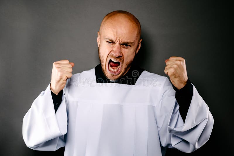 Shouting upset catholic priest in white surplice stock image Shouting upset catholic priest in white surplice stock image