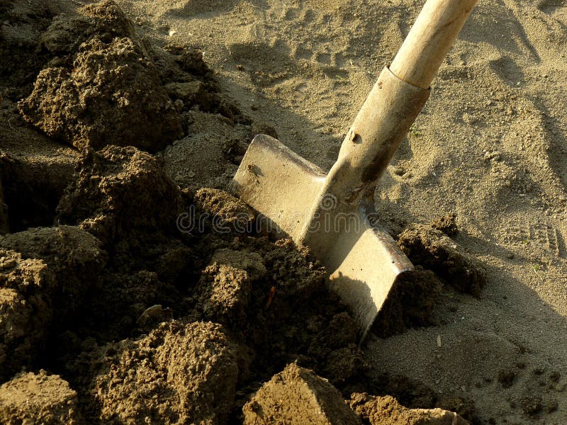Shovel in the ground stock photo. Image of crop, plant 39587308