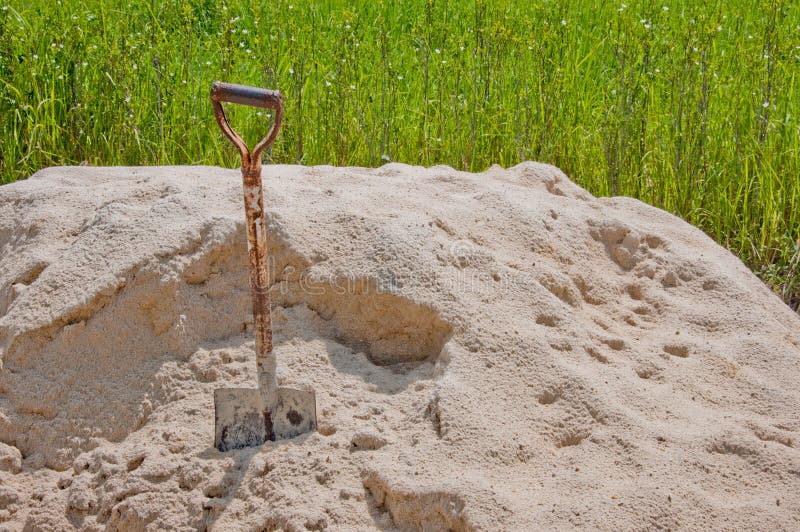 Shovel in sand