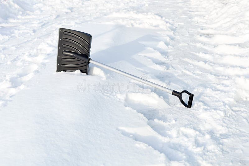 Carpet Beater Over Carpet with Snow for Winter Cleaning Stock Photo