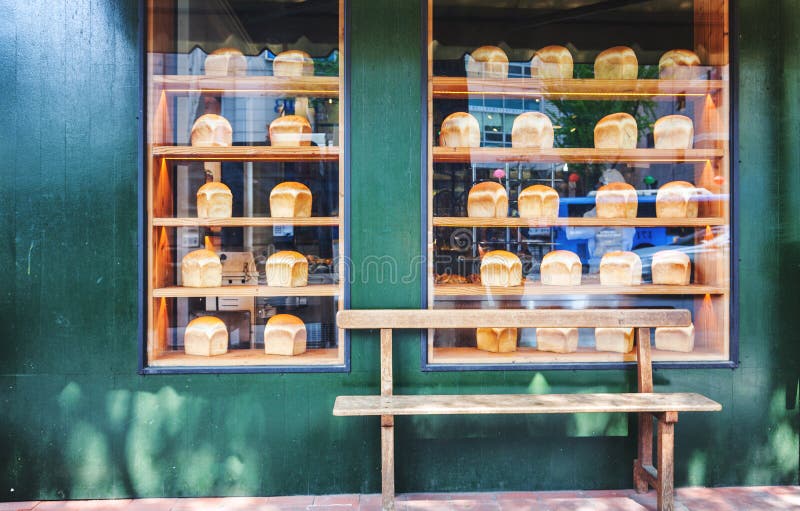 Showcase Bakeries, with Bench Outside Stock Photo Image of city