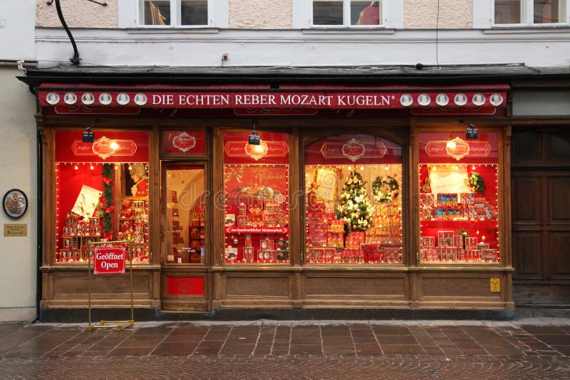 Showcase of Mozartkugeln candy shop in Salzburg, Austria. SALZBURG, AUSTRIA - JANUARY 5, 2013: The facade of house with showcase of Mozartkugeln candy shop in stock photos Showcase of Mozartkugeln candy shop in Salzburg, Austria. SALZBURG, AUSTRIA - JANUARY 5, 2013: The facade of house with showcase of Mozartkugeln candy shop in stock photos
