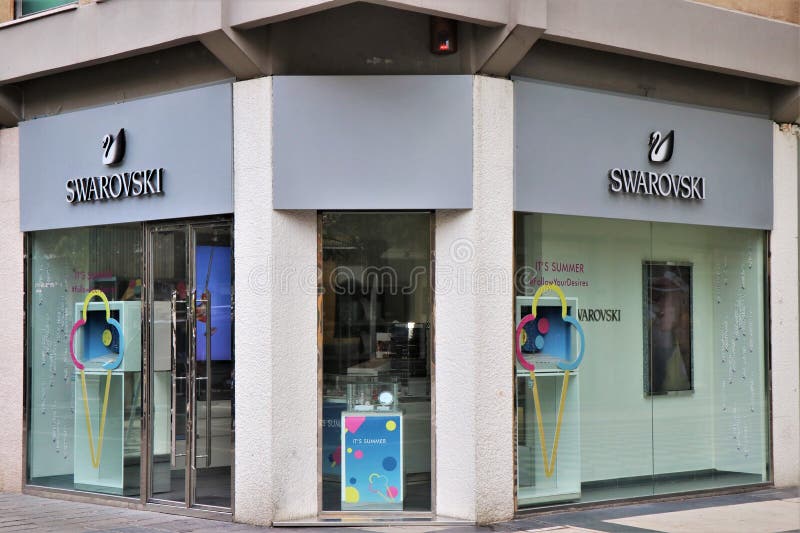 Sign and showcase of a Swarovsky store. stock photos Sign and showcase of a Swarovsky store. stock photos