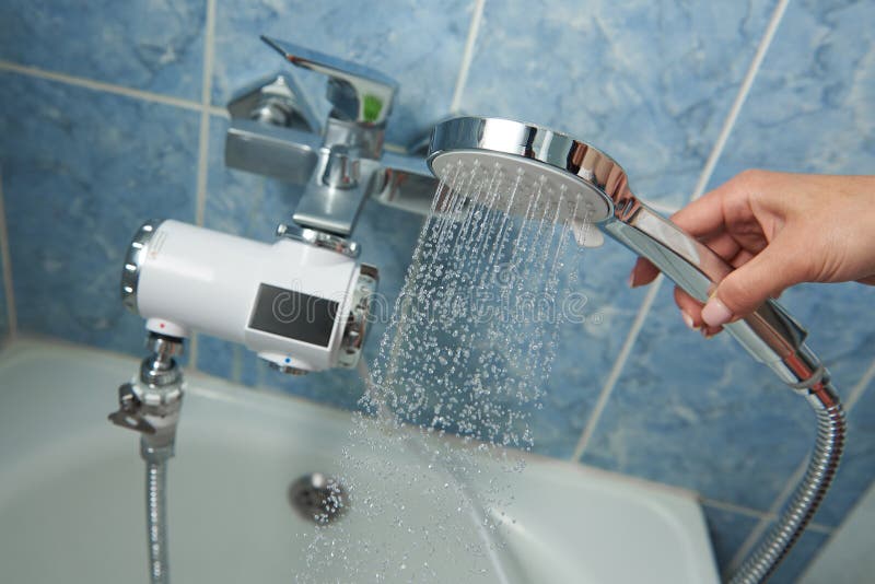 Shower with Electric Water Heater in the Bathroom Stock Image Image