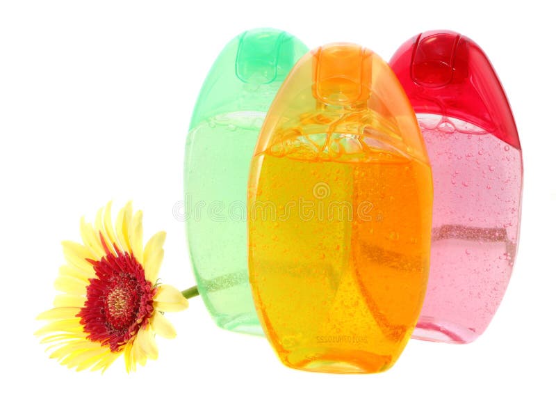 Shower gels and gerbera, isolated.