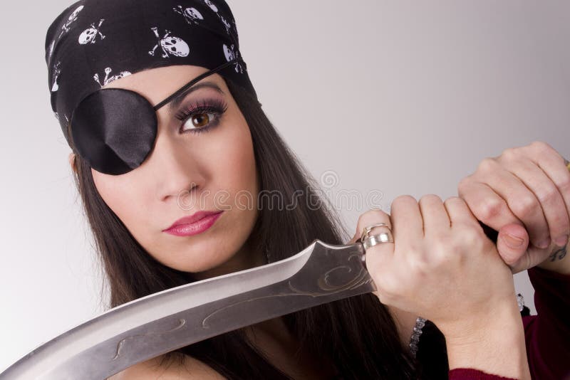 Female Pirate Showing Large Knife Blade Eyepatch. 