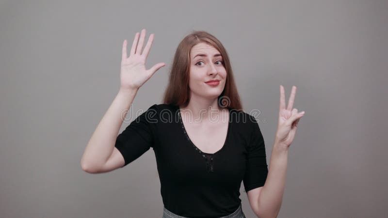 Showing 7 seven fingers hand gesture, show number three with hands, pointing up