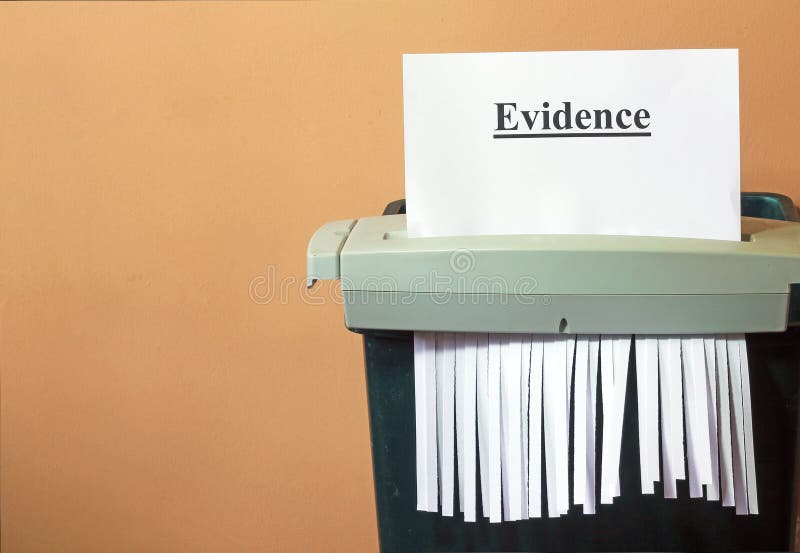 Shredding the evidence, hiding the truth. royalty free stock photos