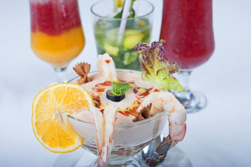 Shrimp cocktail with fruit drinks