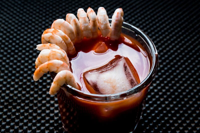 Shrimp Cocktail with red sauce and ice.