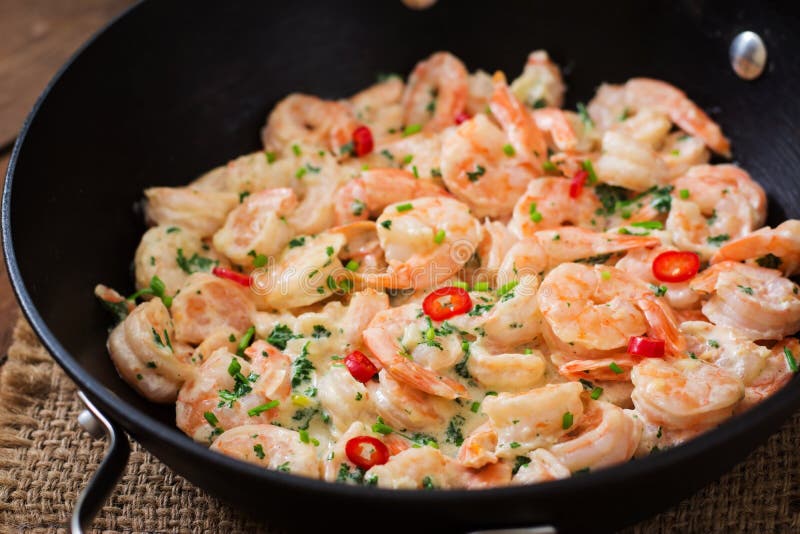 Shrimp in a creamy garlic sauce with parsley and lime