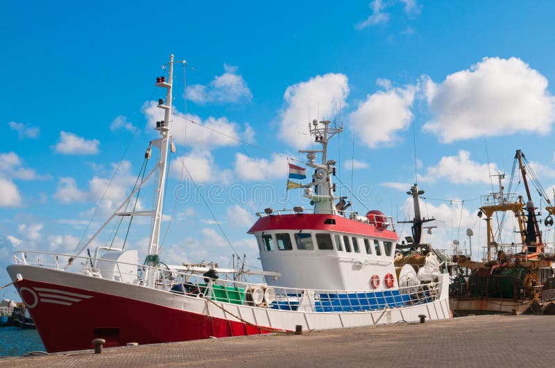 Shrimp fish trawler in the harbour royalty free stock photography