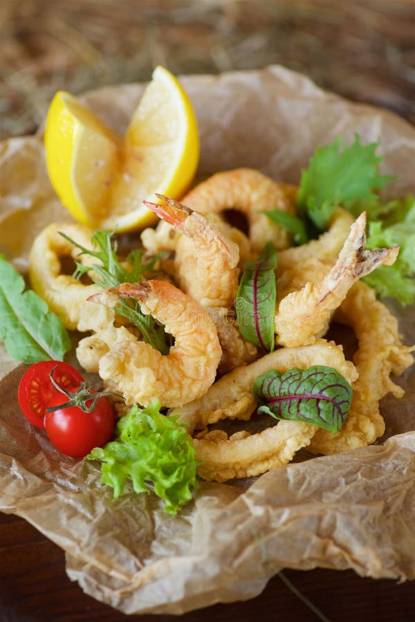 Shrimp, Squid Rings and Other Seafood Deepfried in Batter Stock Photo