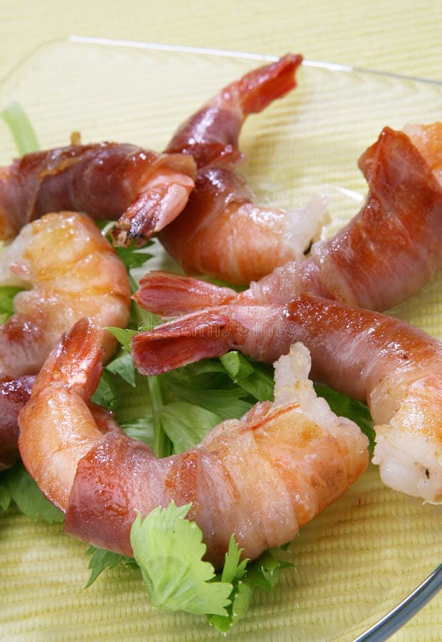 Shrimps rolled in prosciutto