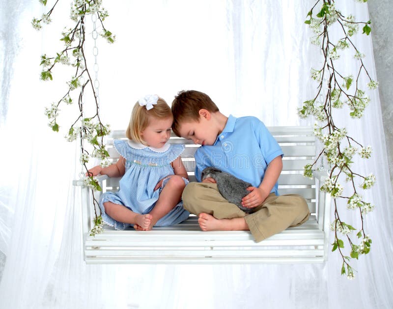 Siblings and Bunny on Swing