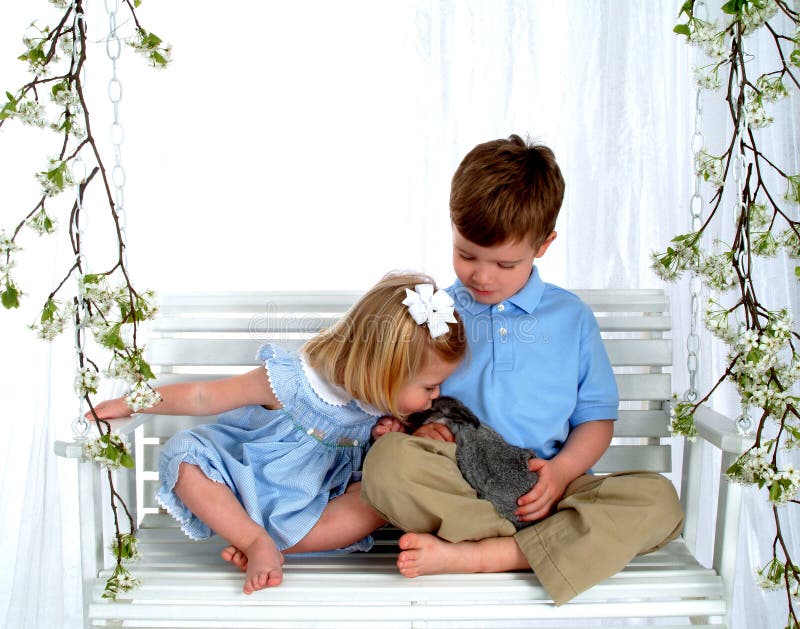 Siblings and Bunny on Swing