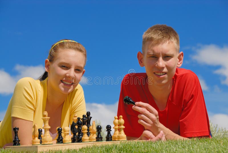 Siblings play chess