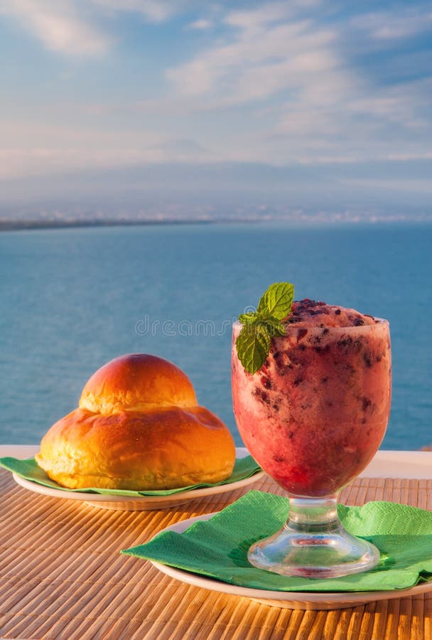 Premium Photo  Traditional sicilian granita coffee flavor with brioche  close up