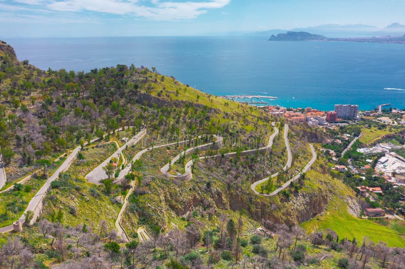 Sicily landscape of serpentine road to town stock photos Sicily landscape of serpentine road to town stock photos