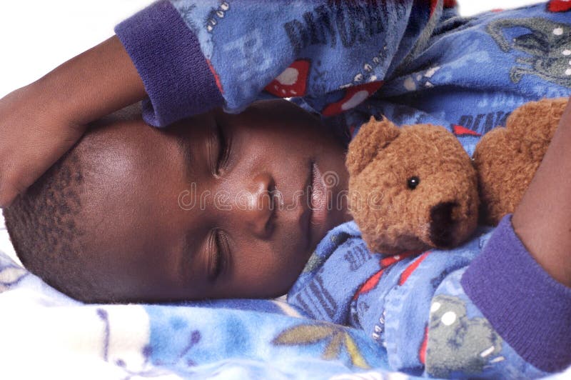 Sick child sleeping with his teddy bear royalty free stock image Sick child sleeping with his teddy bear royalty free stock image