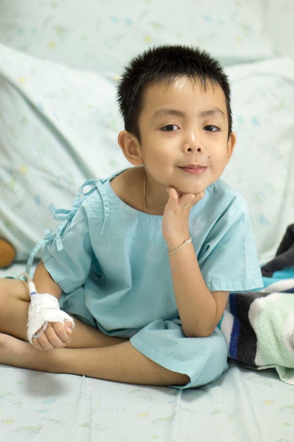 A Sick Little Boy In Hospital Bed. Stock Image Image of cheerful