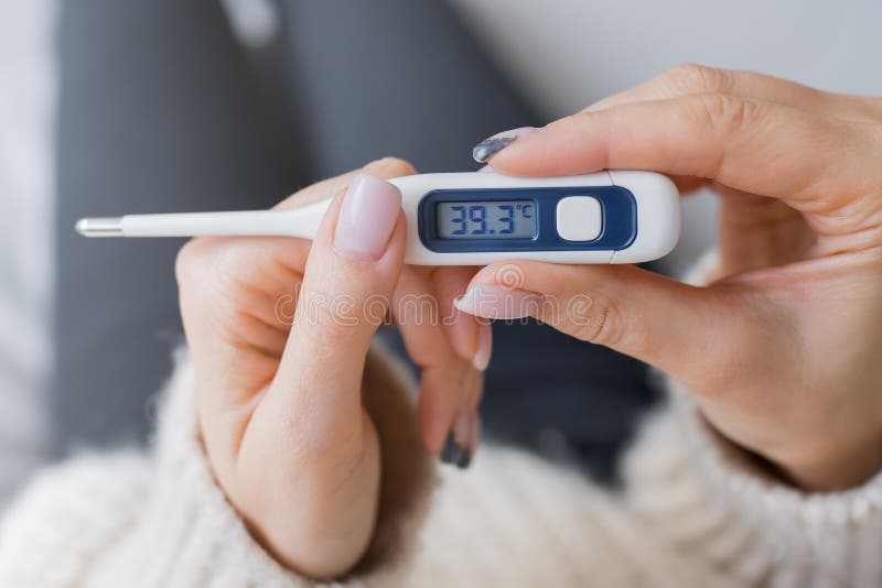 Thermometer with a High Fever Temperature Stock Image - Image of