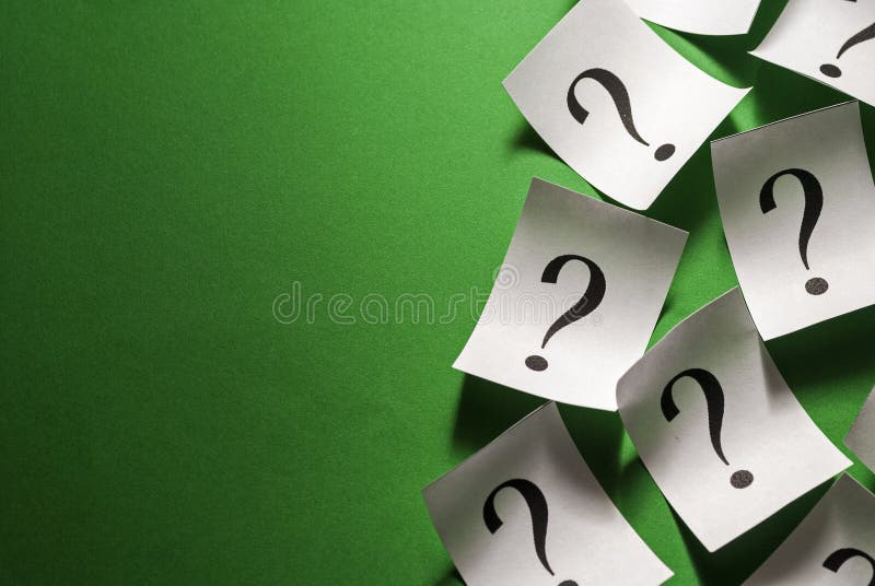 Side border of scattered question marks on small white cards royalty free stock photo