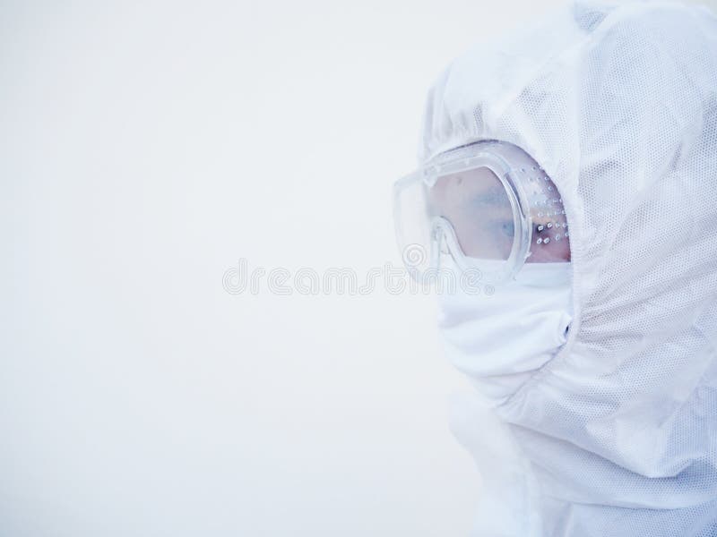 Side of face doctor or scientist in PPE suite uniform with copy space for text or design. coronavirus or COVID-19 concept isolated royalty free stock photography