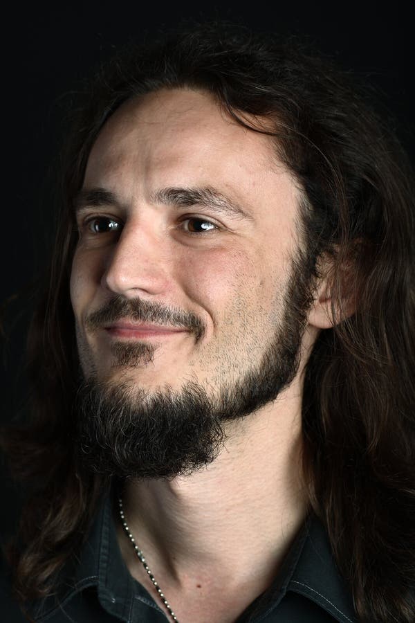 Side portrait of young man with goatee