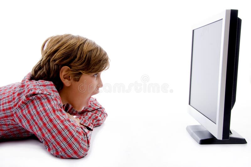 Side pose of boy watching lcd screen