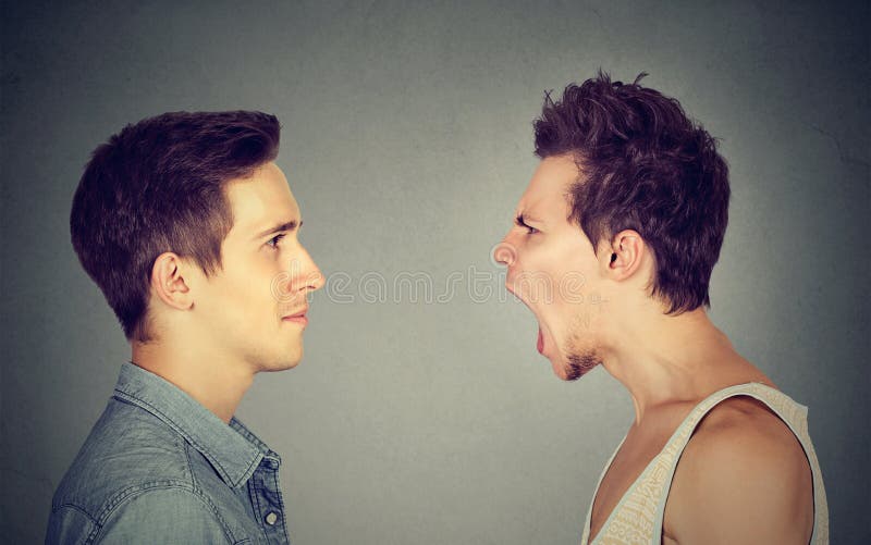 Side profile portrait of young angry man screaming at a calm smiling guy