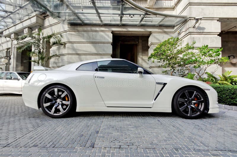 Side profile of white coupe