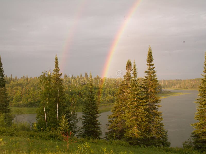 Side by side rainbows stock photos Side by side rainbows stock photos